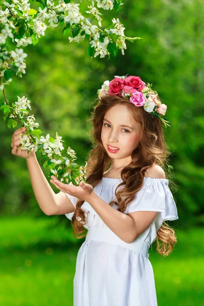 Girl White Dress Wreath Her Head Holds Blossoming Tree Bright — Stock Photo, Image