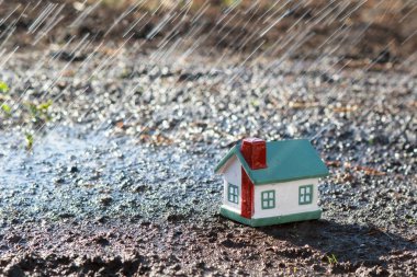 Little house in the rain. clipart