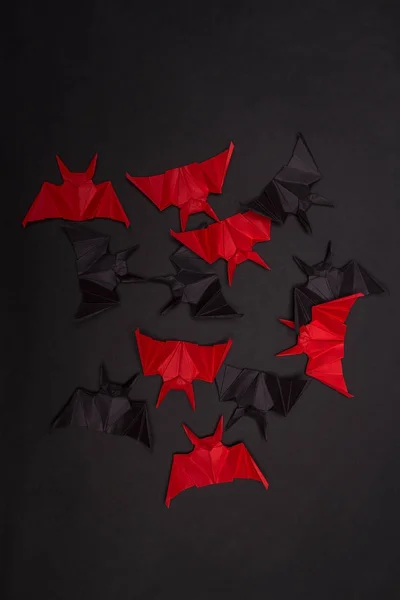 Απόκριες ιστορικό. Μαύρο φόντο. Κόκκινο και μαύρο νυχτερίδες — Φωτογραφία Αρχείου