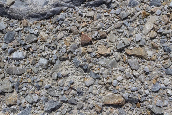 Placer of large stones in a stone quarry close-up. Mining industry. — Stock Photo, Image