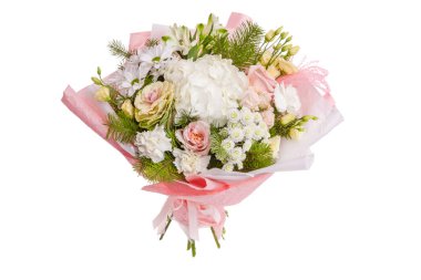 Artificial rose flowers in green vase on white background.