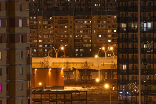 view of the expressway and windows of night houses