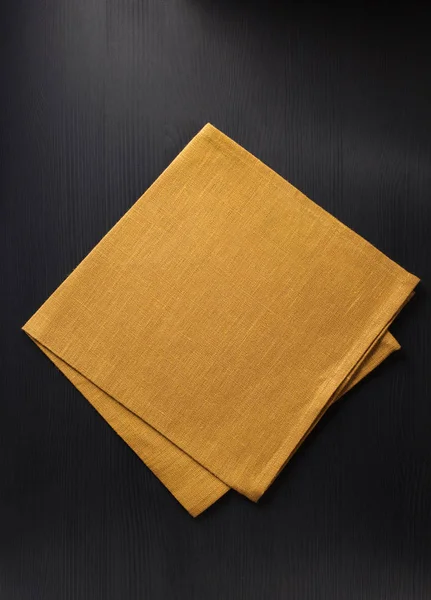 Cloth napkin on wood — Stock Photo, Image