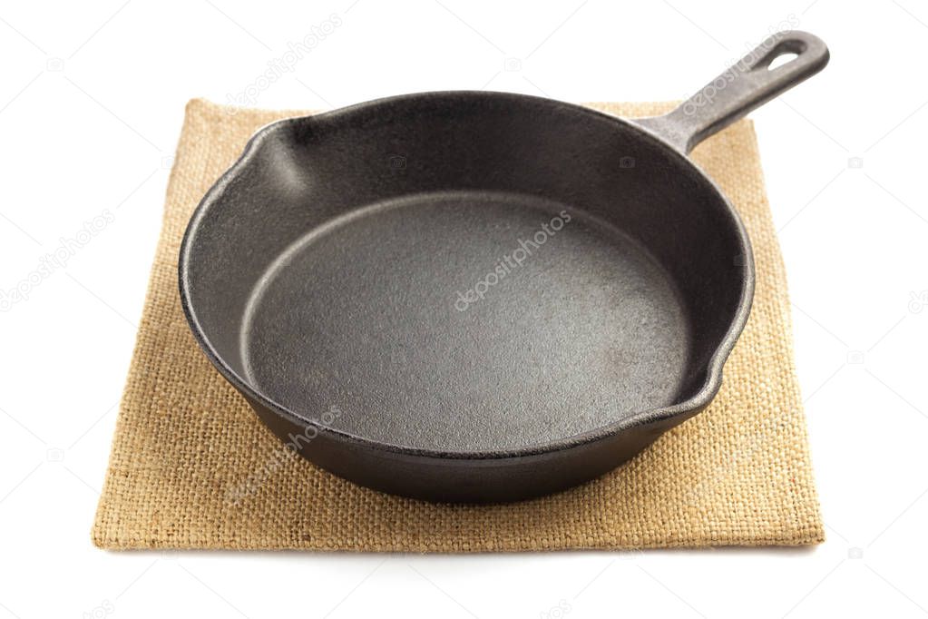 frying pan and napkin isolated on white 