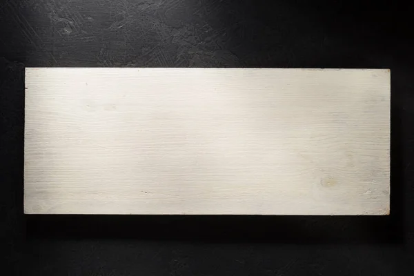 Cartello in legno su sfondo nero — Foto Stock