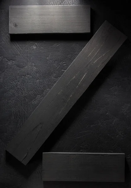 Deski o czarna ściana — Zdjęcie stockowe