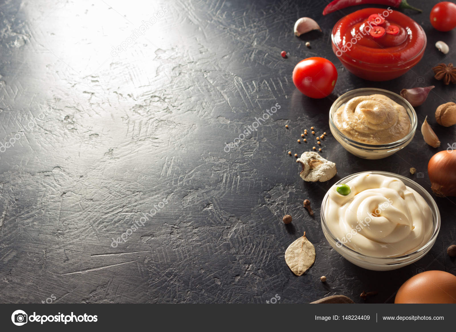 Tomato sauce, mayonnaise and mustard in bowls — Stock Photo © seregam
