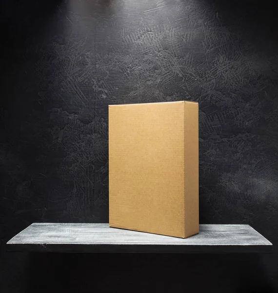 Cardboard boxes on wooden shelf — Stock Photo, Image