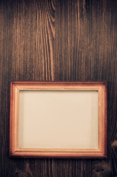 Photo picture frame on wood — Stock Photo, Image