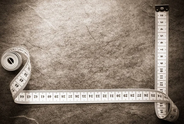 Tablo üzerinde ölçüm bandı — Stok fotoğraf