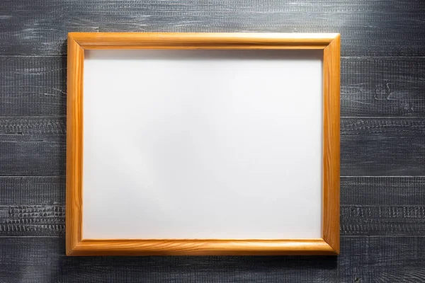 Photo picture frame at wooden background — Stock Photo, Image