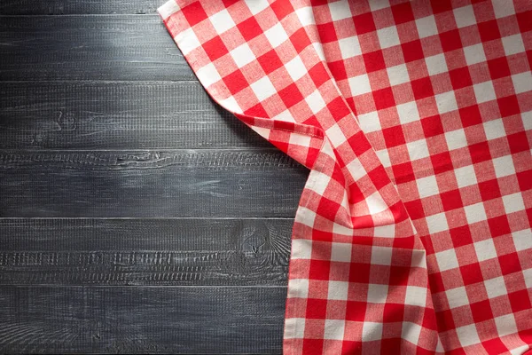 Cloth napkin checked on wood — Stock Photo, Image