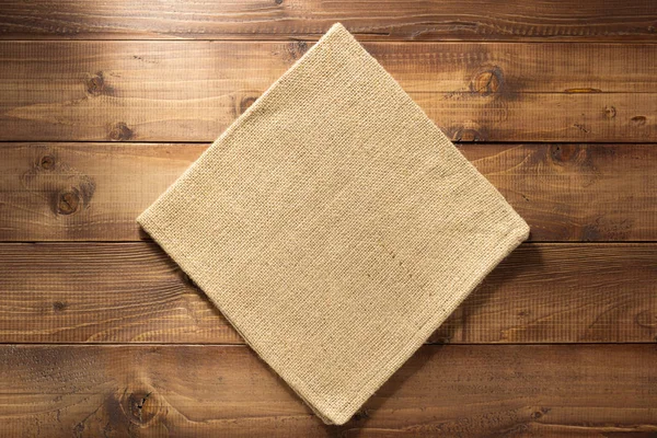 Cloth napkin on wood — Stock Photo, Image