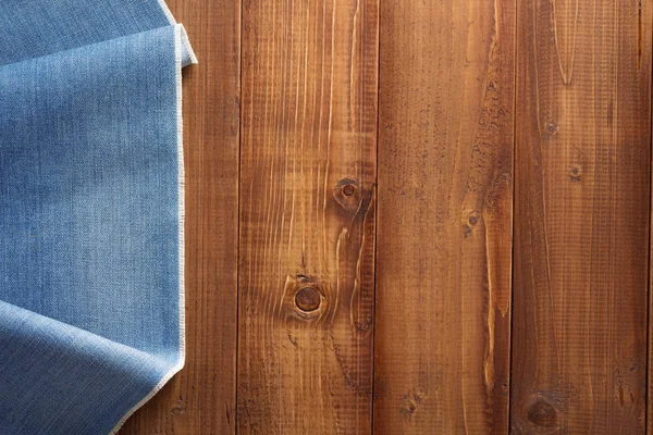 Jeans bleu texture sur bois — Photo