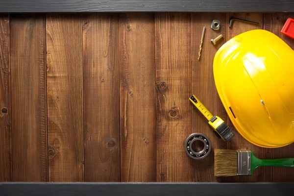 Construction tools on wooden table — Stock Photo, Image