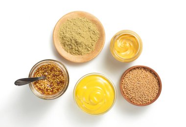 kapta beyaz zemin üzerine hardal sosu