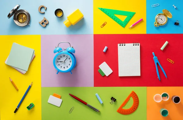 School supplies at abstract colorful background — Stock Photo, Image