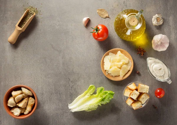 Caesar salad ingredients at stone table — Stock Image Caesar salad ingredients at stone table Stock Image