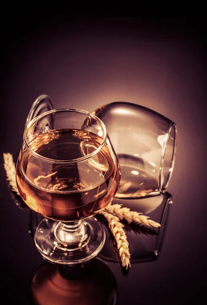 Cognac glass on black — Stock Photo, Image