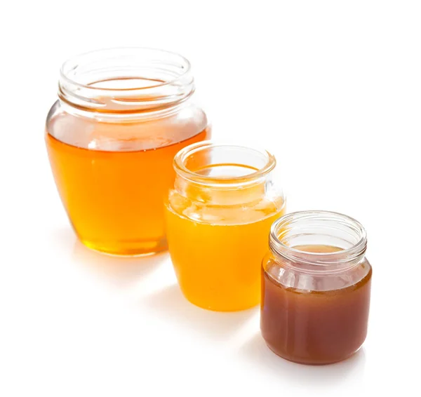 Variety of honey in jar white background — Stock Photo, Image