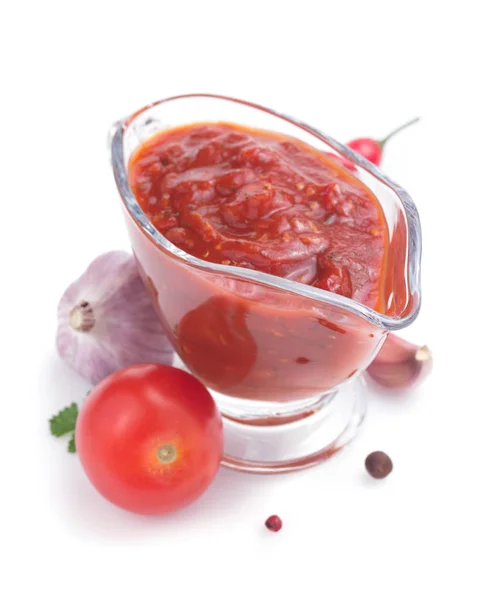 Salsa de tomate en salsa de barco en blanco —  Fotos de Stock