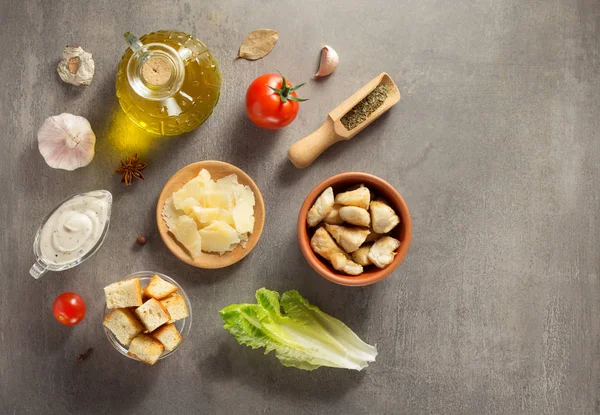 Caesar salad ingredients at stone table — Stock Image Caesar salad ingredients at stone table Stock Image