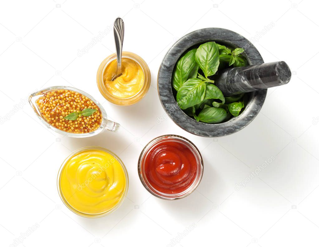 set of dip sauces and spices  on white