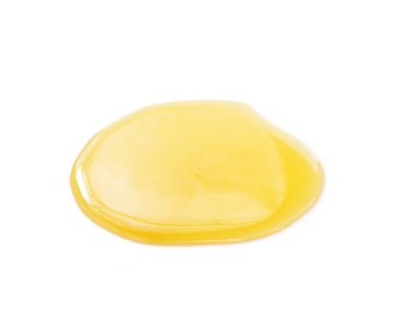 beyaz zemin üzerine bal ya da reçel lekesi