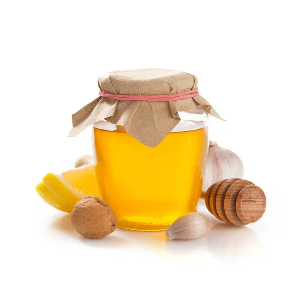 흰색 바탕에 꿀 유리 항아리 — 스톡 사진