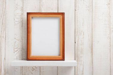 photo picture frame at wooden shel clipart