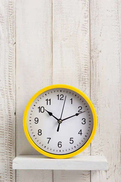 Wall clock at wooden background — Stock Photo, Image