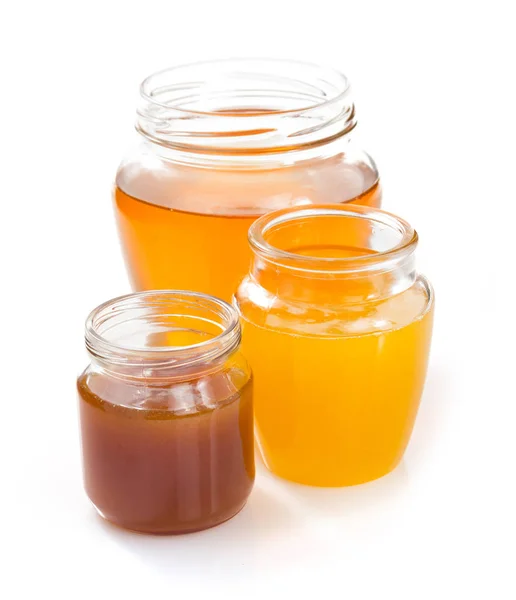 Variety of honey in jar white background — Stock Photo, Image