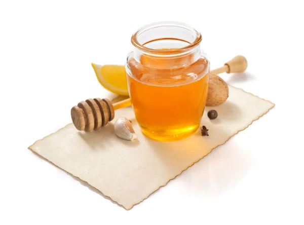 Jar of honey on white background — Stock Photo, Image