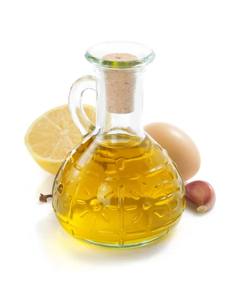 Bottle of oil isolated and spices at white — Stock Photo, Image