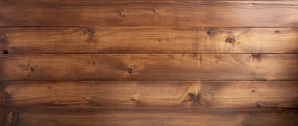 Prancha marrom fundo de madeira — Fotografia de Stock