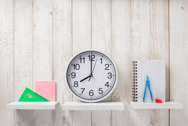 School supplies and tools on wooden shelf — Stock Photo, Image