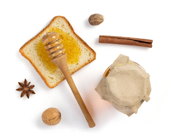 Med a chleba na bílém — Stock fotografie