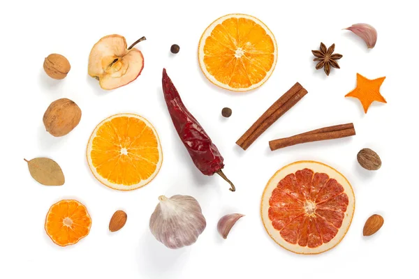 Dried fruit and spices on white background — Stock Photo, Image
