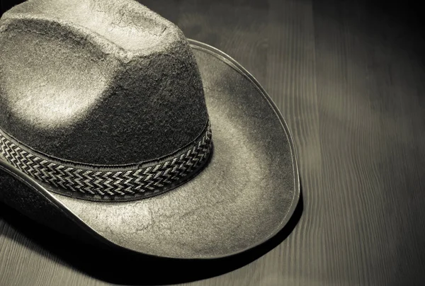 Cowboy hat on wood — Stock Photo, Image