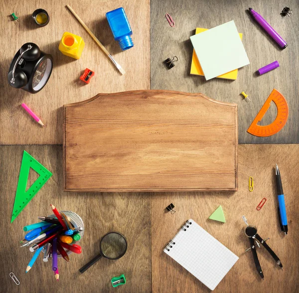 School supplies at wooden background — Stock Photo, Image