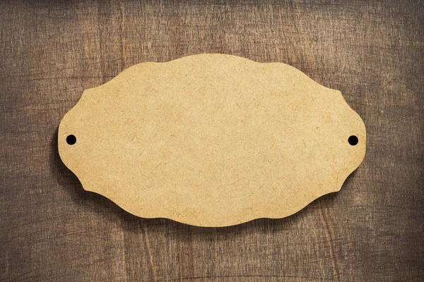 Deska drewniany znak na podłoże drewniane — Zdjęcie stockowe