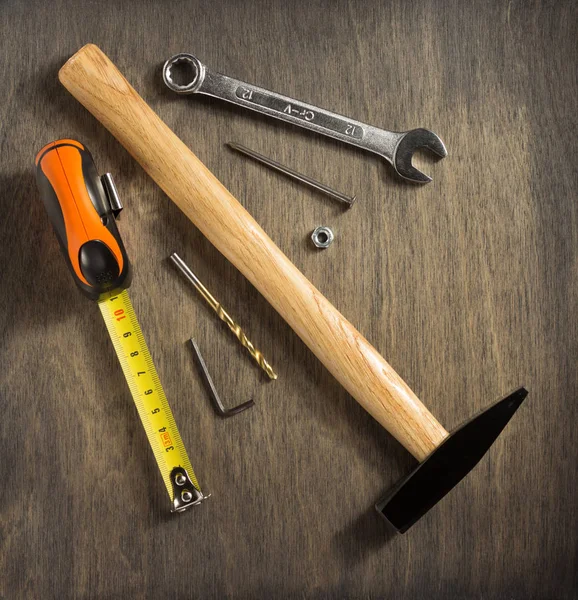 Set van tools en instrumenten op hout — Stockfoto