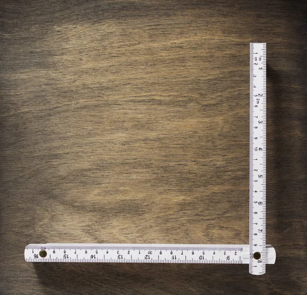 Meterlineal auf Holz — Stockfoto