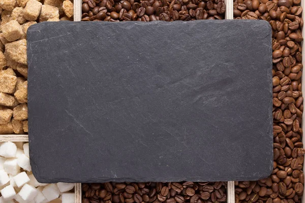 Coffee beans and slate stone black tray — Stock Photo, Image