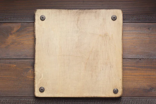 Ονομαστική πλάκα σε ξύλινη υφή φόντου — Φωτογραφία Αρχείου