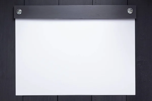 Sheet of paper with empty pages on black background — Stock Photo, Image