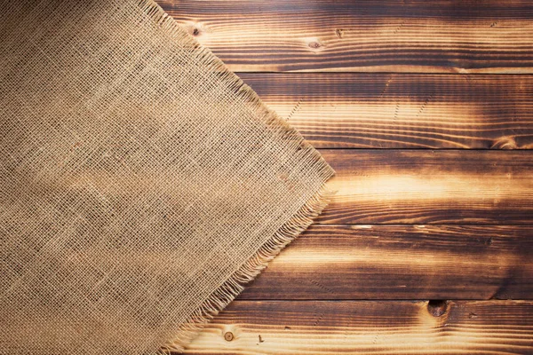 Мешковатая текстура на деревянном фоне — стоковое фото