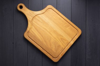 rustik ahşap tahta arka planda pizza kesme tahtası