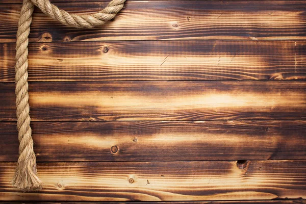 Канат на деревянном фоне — стоковое фото