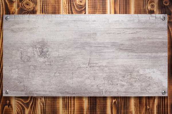 Tabliczka z nazwiskiem lub napis ścienny na czarnym drewnianym tle — Zdjęcie stockowe